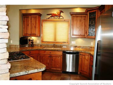 Kitchen. Open Kitchen with alder cabinets, slab gr