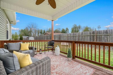 Step onto the covered front porch and 