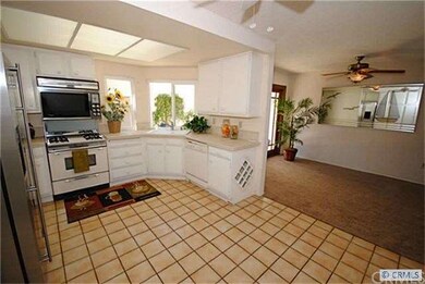 Kitchen is open to dining room.