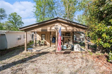 Rear view of house with a patio