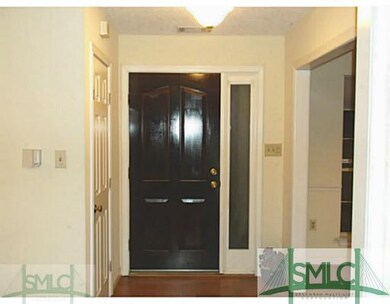 Foyer. Door is not quite that shiny in person.  Ni