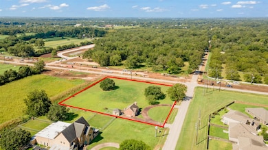 Approx. 1.9 acres with a small home and available