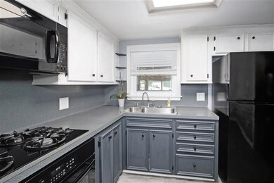 Beautiful Gray cabinets and flooring recently updated