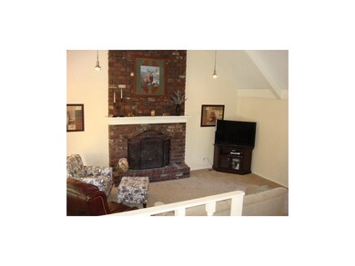 Great Room with Massive Floor-to-Ceiling Brick Fir