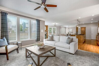 Spacious Open Concept Main Level  - living room is open to the kitchen, hearth room and eat in area off the patio -  perfect place to entertain!