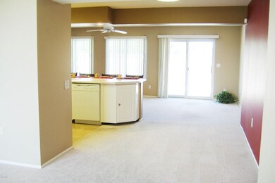 VIEW TO KITCHEN AND FAMILY ROOM