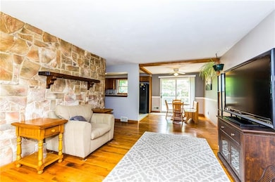 As you enter the front door into the living room, 