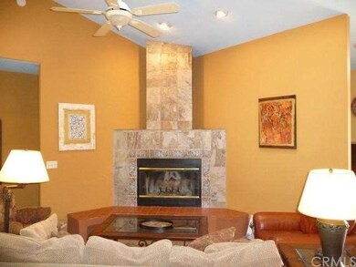 Great Room with fireplace, cathedral ceiling, skyl