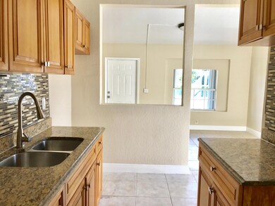 KITCHEN W GRANITE COUNTER
