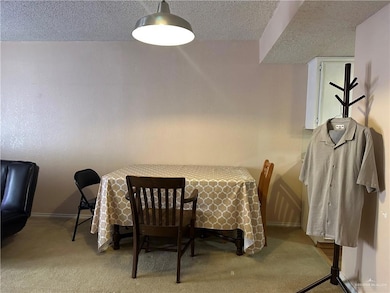 Spacious dining area with direct access to the kitchen