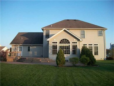Exterior Back. Beautiful morning room looks out on