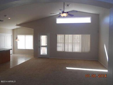 family room with vaulted ceilings