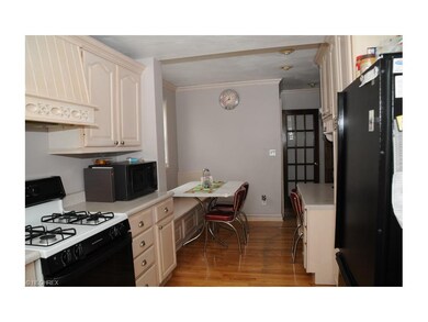 Gorgeous kitchen with hardwood floor and eat-in ar