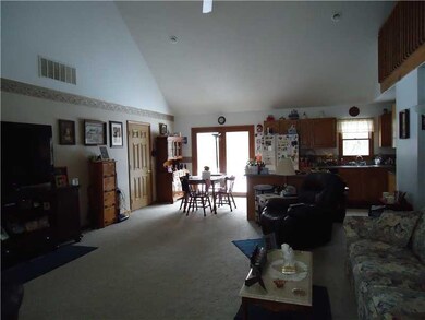 Exterior Front. Great Room and Dining area and Kitchen