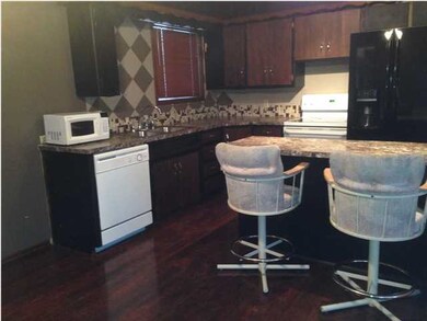 Updated Kitchen & Dining Area with Wood Laminate F