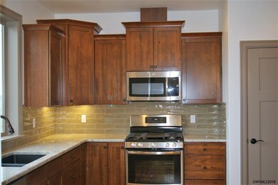 Granite counters and stainless steel appliances.