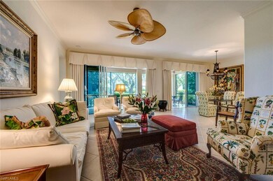Living room looking out to lanai and dining area.