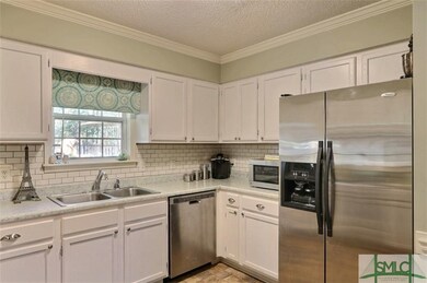 Kitchen Window Overlooks Your Beautiful Back Yard