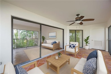 HUGE covered lanai serves as extended living room, shown here virtually staged.