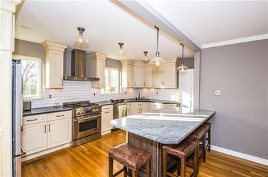 Gourmet kitchen with beautiful counters and top of