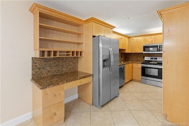 1935 SW Silver Pine Way unit 117D1, Palm City, FL 34990 - photo 7