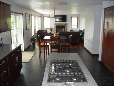 Kitchen. Eat in kitchen with built in gas cooktop 