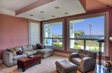 Ocean view formal living room as your guests enter