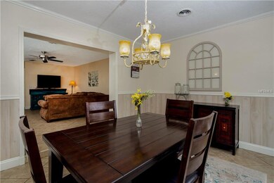 Light and airy dining room is located off the fami