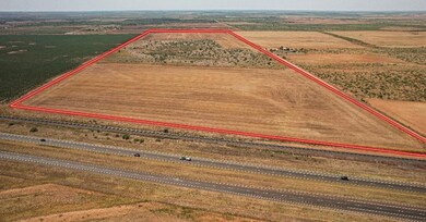 Birds eye view of property featuring a rural view