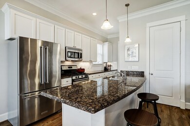 Island kitchen with an abundance of storage and a