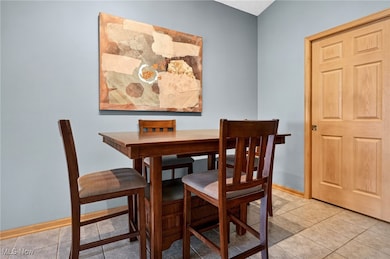Dining room with ceramic tile flooring
