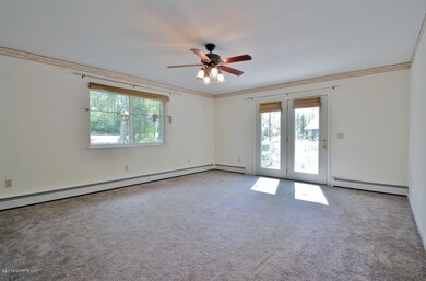 Living Room with patio doors to deck
