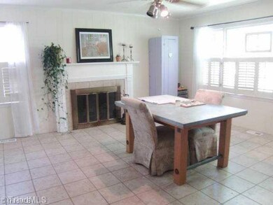 Den/Family/Great Room. This is the Family Room off the kitchen note another fireplace in this room, large room with tile flooring, plus there is a 1/2 bath off this room