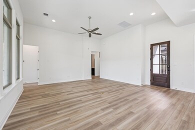 Unfurnished living room with recessed lighting, light wood-style floors, and a ceiling fan