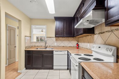 Culinary delights await in the kitchen, boasting l