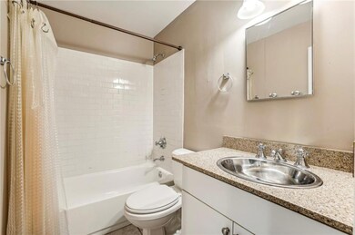Full bath with vanity, shower / bathtub combinatio