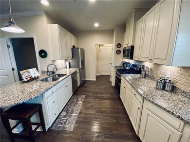 Gorgeous kitchen with upgraded cabinets, granite c