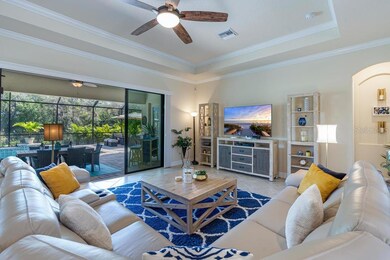 Amazing living area with tray ceilings
