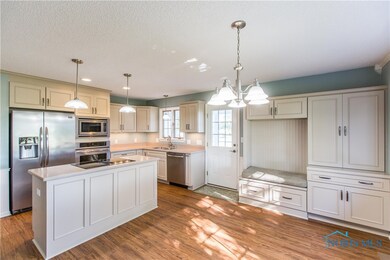 Beautifully updated kitchen has plenty of cabinets