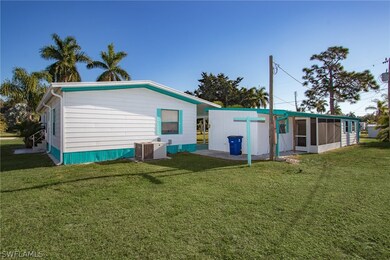 5921 Wisconsin St, Bokeelia, FL 33922 - photo 4