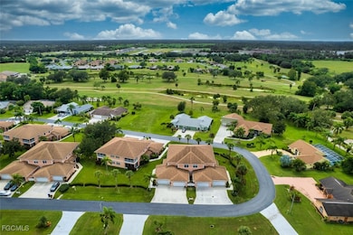 Aerial perspective of suburban area with a golf club