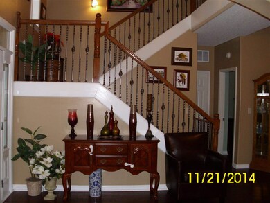 The open two-story entry offers an exceptional vie