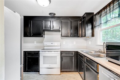 Kitchen with sink, light hardwood / wood-style flo