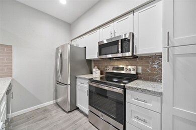 Notice the sizable cabinets and pantry space. 
Th