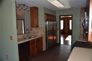 New stainless dishwasher. Notice the under mount sink.