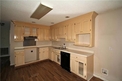 Kitchen with good amount of counter space and pantry.