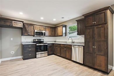 613 W Dryden St, Odessa, MO 64076 - photo 3