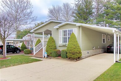 Carport is large enough to accommodate two vehicle