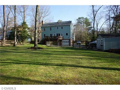 Exterior Back - Almost 1/2 acre Landscaped & Fence