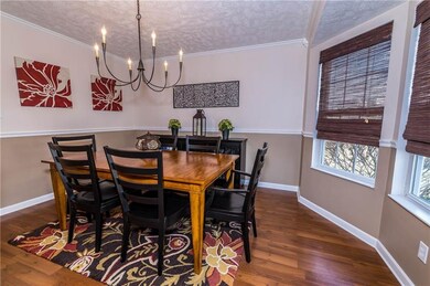 To the right of the foyer is the spacious, brightl
